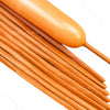 A close-up of orange magic twisting balloons arranged in a fan shape.