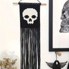 Tapestry macramé noir avec un crâne blanc et des franges longues