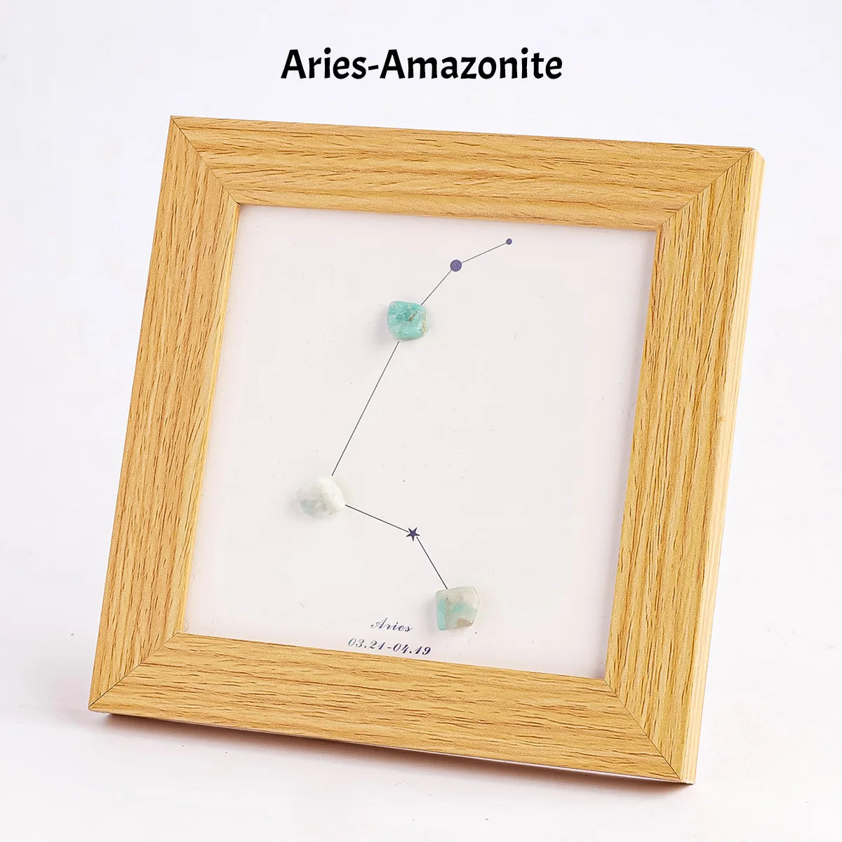 Foturahme mit drei natürlichen Kristallen, die das Zeichen Aries darstellen.