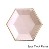 Eight 7-inch pink disposable plates with gold trim