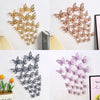A set of 3D hollow butterfly wall decals in gold, rose gold, and purple colors.