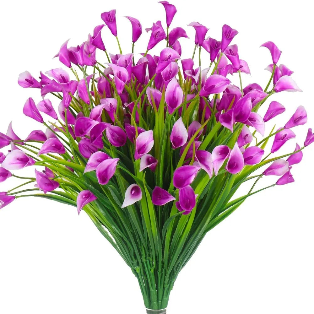 A bouquet of vibrant purple artificial calla lilies with green stems for home decor