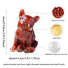 A glossy red crystal dog statue with gold foil accents, showing bubbles in the resin and small cracks.