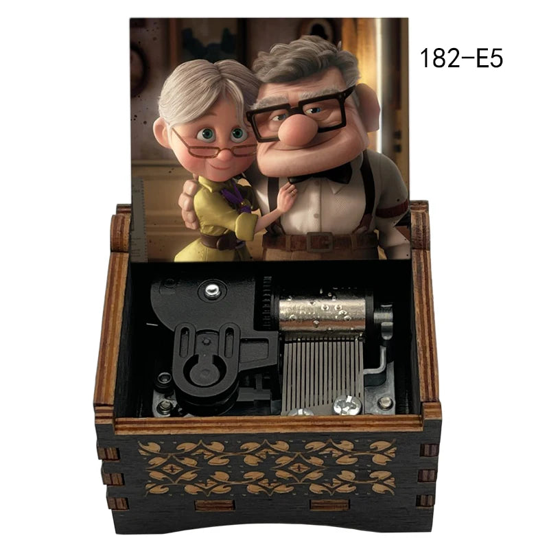 A wooden music box featuring two characters, a woman and a man, in a scene related to married life.