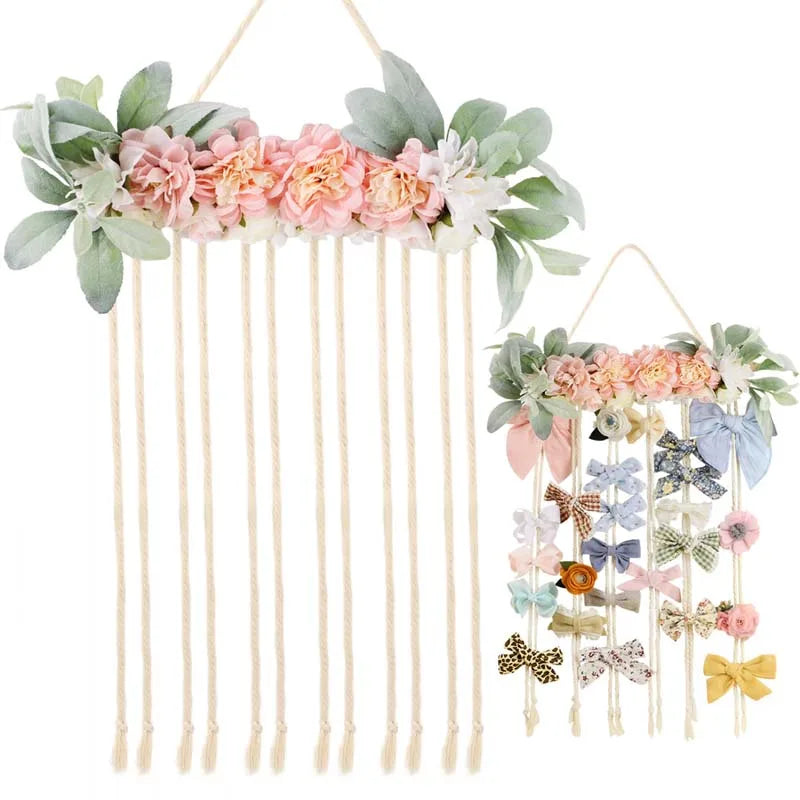 Wall-mounted headband holder featuring pink and green floral accents