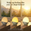 A sunrise alarm clock with a glowing night light is shown on a wooden surface next to a window view.