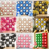A collection of double-sided square foil balloon wall panels in various colors like pink, gold, silver, and black.