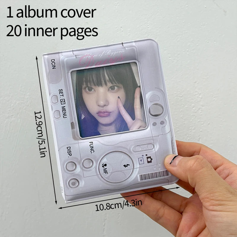 A silver photo card album binder with one cover and twenty inner pages is held in a hand.