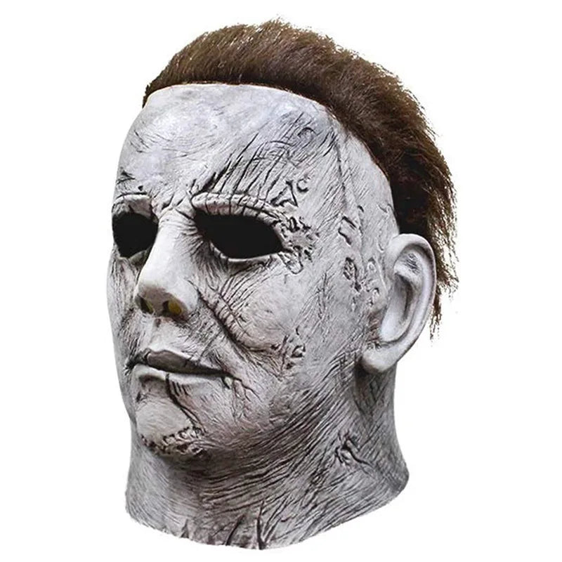 A realistic horror mask resembling Michael Myers, sculpted in gray and white to depict aged or scarred skin.