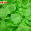 Bright green silk rose petals used for weddings and events