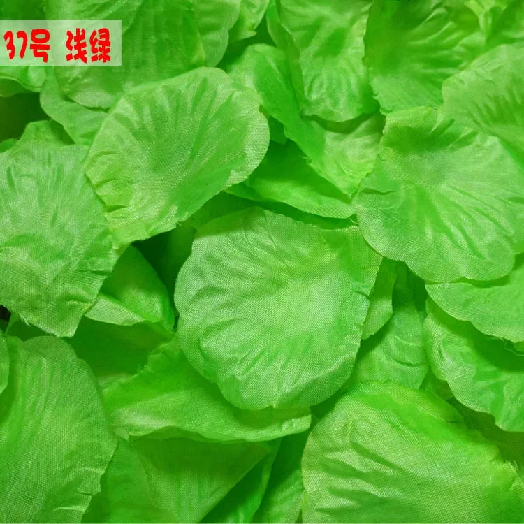 Bright green silk rose petals used for weddings and events