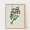 Botanical philodendron canvas wall art featuring green leaves on a light beige background