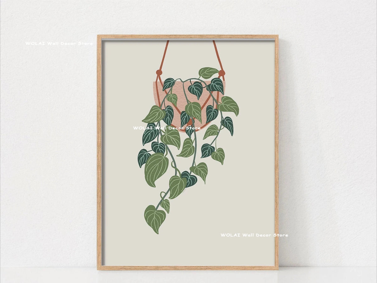 Botanical philodendron canvas wall art featuring green leaves on a light beige background