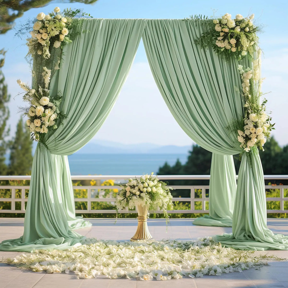 A light mint green satin backdrop curtain draped in a V-shape for an event or photoshoot.