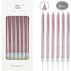 A set of 6 pink gradient metallic birthday candles in a rectangular packaging box.