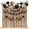 A festive birthday backdrop featuring leopard print balloons and a hanging tassel curtain.
