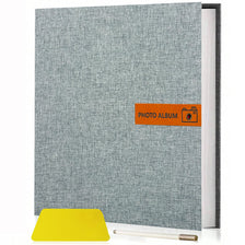 A grey linen self-adhesive photo album with an orange label indicating PHOTO ALBUM.