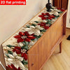 A long table runner featuring a festive design of red and white poinsettia flowers and green leaves.