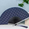 A dark blue patterned titanium alloy folding hand fan is displayed against a light blue background.