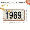 A vintage style aluminum license plate with the year 1969 embossed on it.
