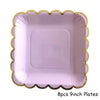 Eight 9-inch purple and gold party plates for celebrations