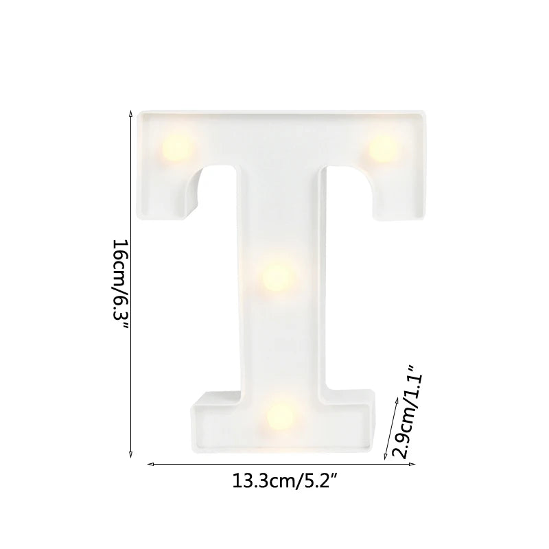 A white alphabet letter light shaped like the letter T, emitting a warm white glow.