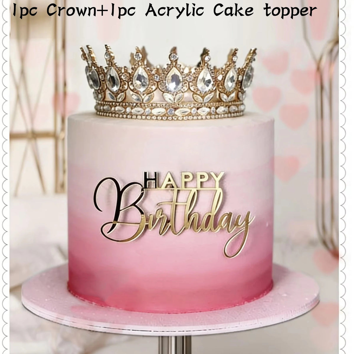 Pink cake decorated with a rhinestone crown topper and gold birthday lettering