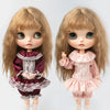 A pair of vintage lace pajama sets for 1/6 dolls, featuring light brown hair and pink and maroon fabric.