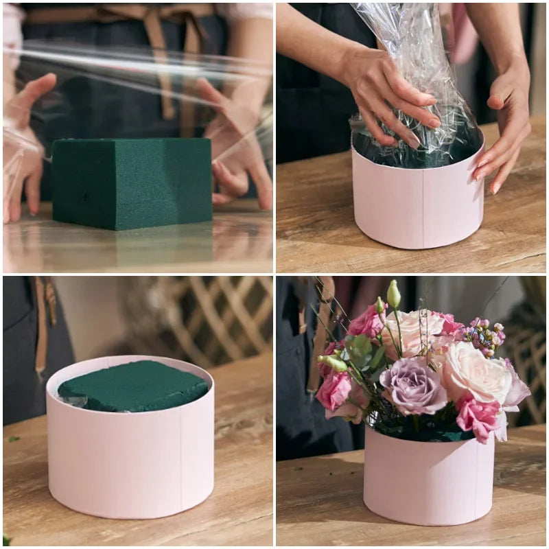 Hands are placing wet floral foam blocks into pink containers for party decor.