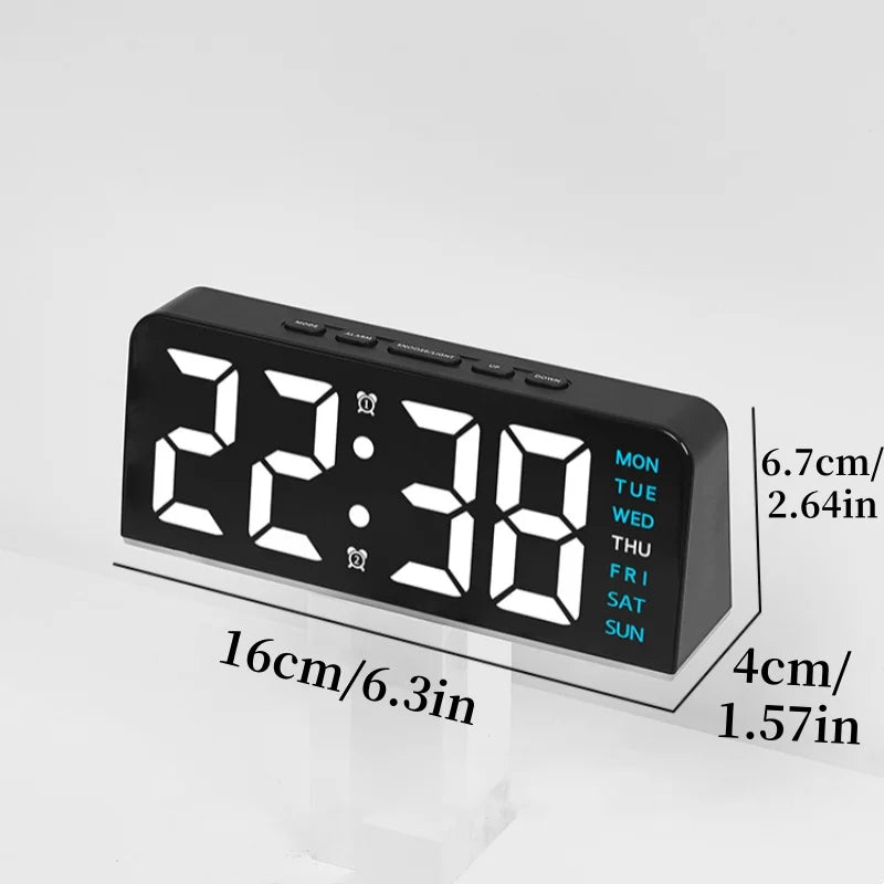 A black digital alarm clock with a bright display showing 22:38, featuring mood light and dual alarms.