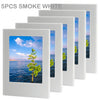 Five smoke white magnetic photo frames displaying scenic outdoor photos