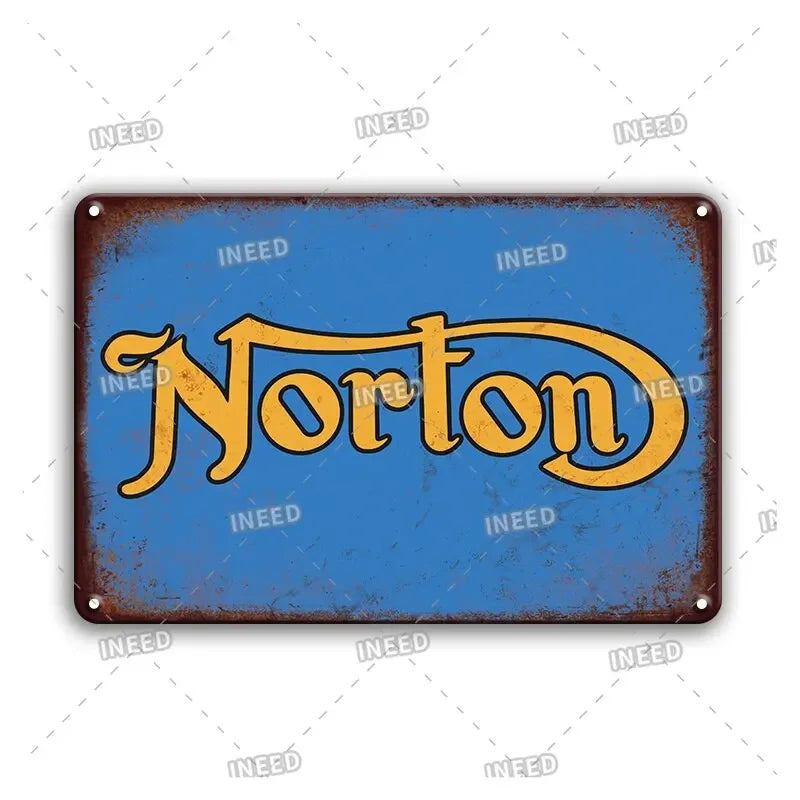 A vintage metal sign with the name Norton in yellow script on a blue background.