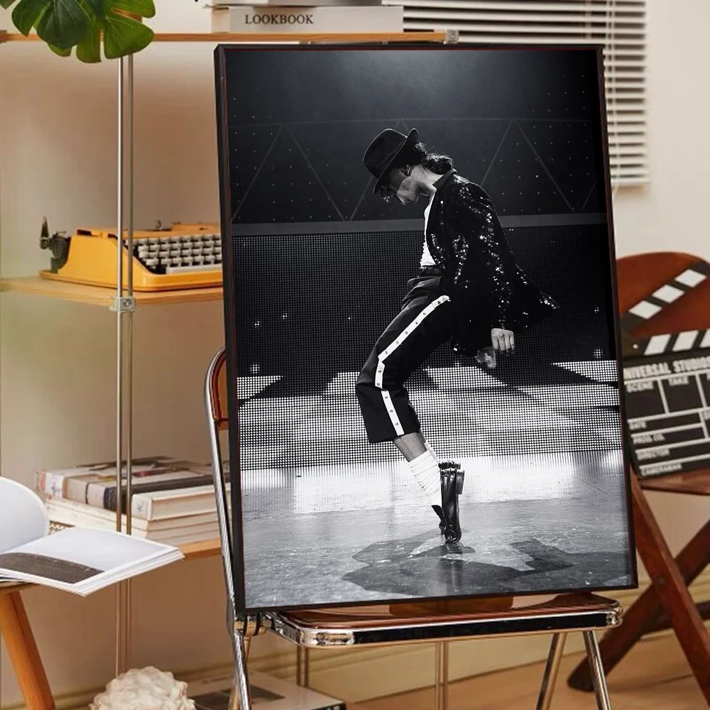 A framed poster of Michael Jackson in a vintage style, featuring black and white photography.
