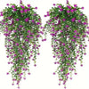 A set of three lifelike faux eucalyptus hanging plants with vibrant green leaves and purple flowers.