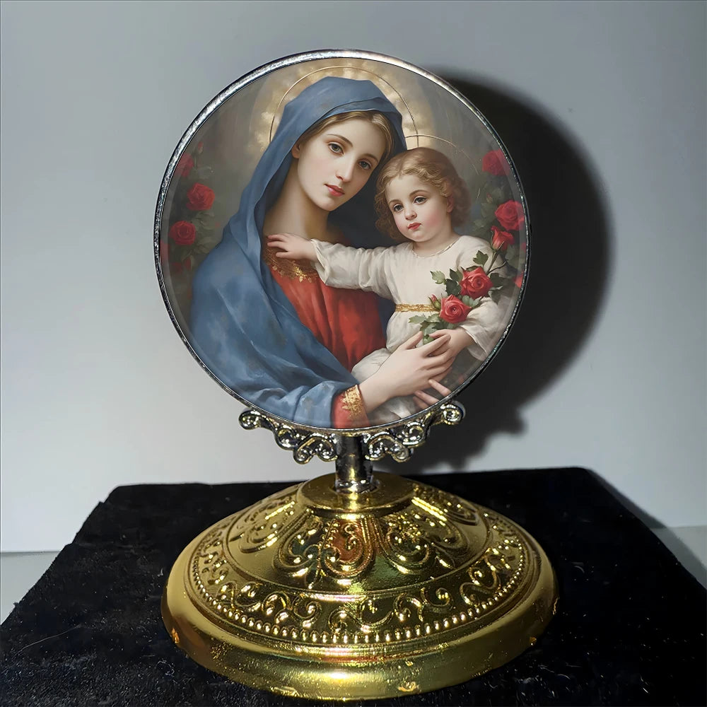 A painting of the Virgin Mary and the Christ Child in a halo set within a decorative gold-toned frame.