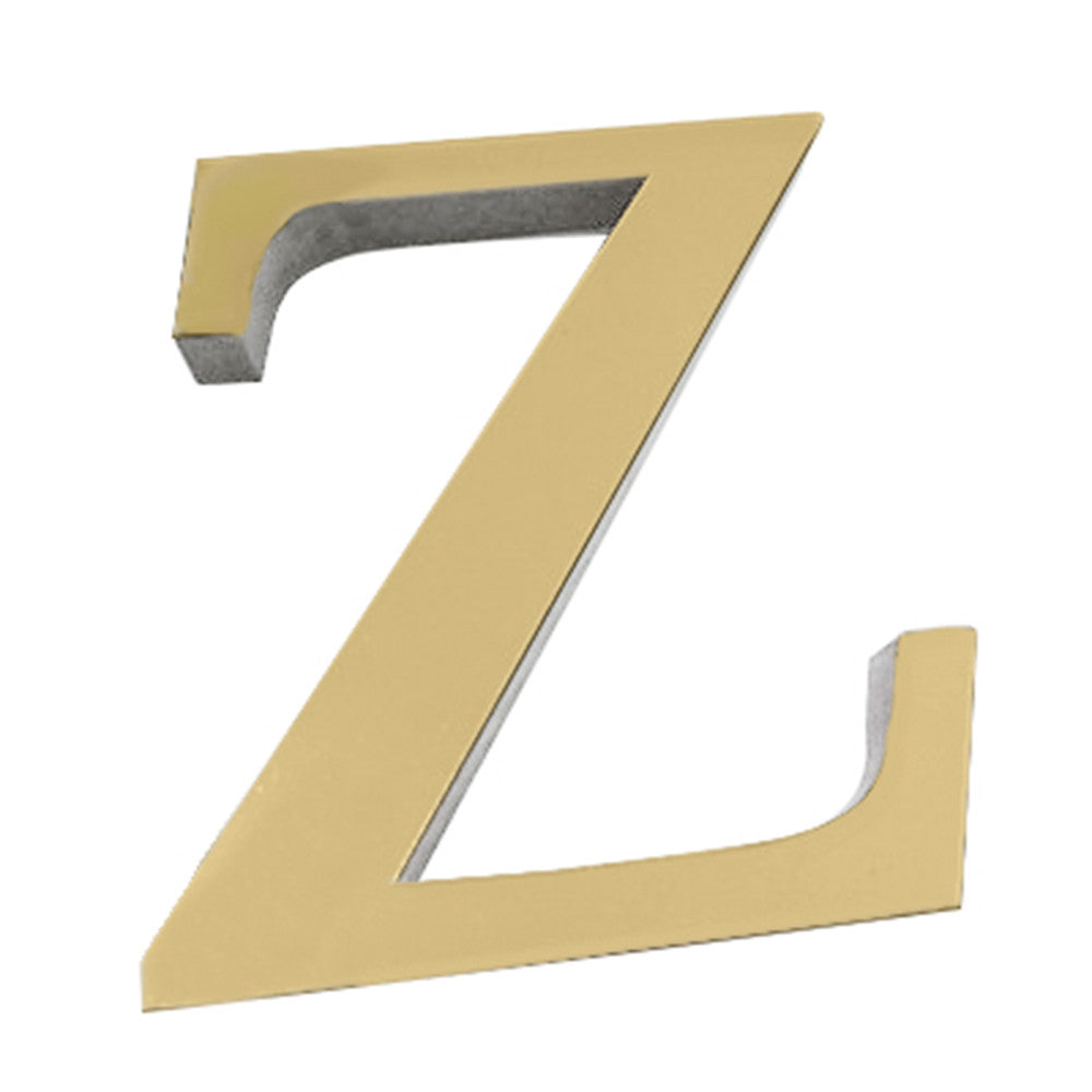 A gold letter Z cutout used as a mirror wall decal.