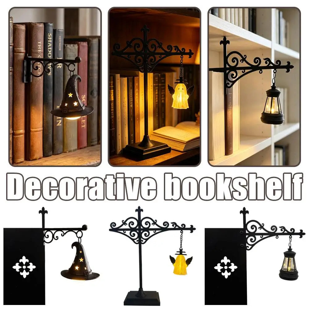 Decorative bookshelf featuring black wrought iron book lamps and decorative accents.