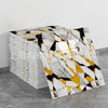 Stack of faux marble 3D self-adhesive wall tiles featuring black and white veining with gold accents
