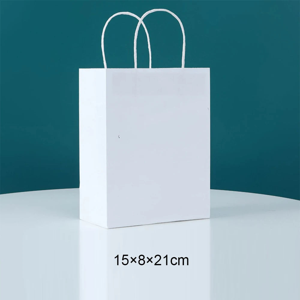 White disposable paper food trays with handles displayed against a teal background.