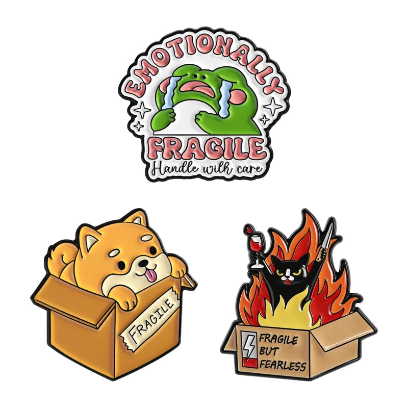 A set of enamel pins featuring cartoon cat designs with rude middle finger and daisy flower motifs.