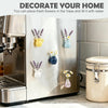 Mini ceramic fridge magnets for decoration placed on a stainless steel refrigerator with fresh flowers.