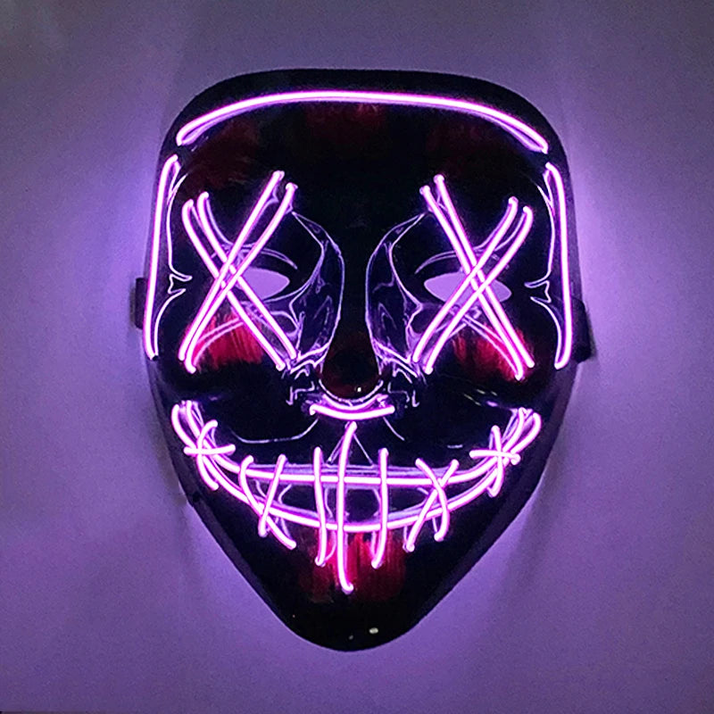 A glow-in-the-dark LED purge mask featuring glowing purple lines forming an 'X' pattern across the face.
