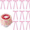Pink gingham ribbon bow cake toppers in various styles and sizes