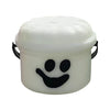 A white plastic miniature pumpkin bucket with a smiling face and handles for Halloween treats and decor.