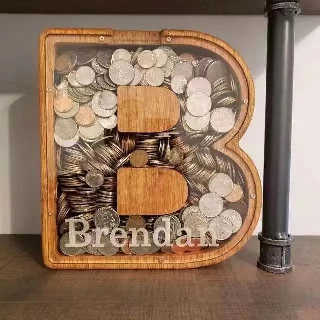 Alphabet wooden piggy bank coin box shaped like the letter B made of coins