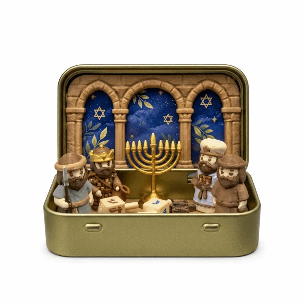 A gold-colored storage tin holds a nativity scene figurine set featuring figures and an arched backdrop with a menorah.