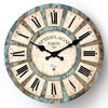 A rustic wooden wall clock with Roman numerals and the inscription PARIS 1979 on the face.