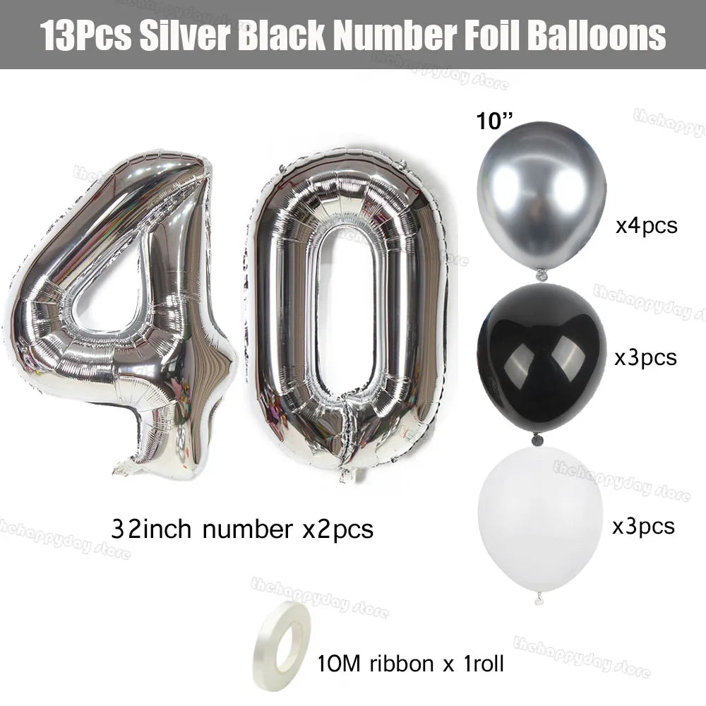 Silver and black number foil balloons including 40, 10, and 32 inch numbers with ribbon