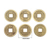 A set of antique Chinese Feng Shui coins for wealth and good fortune, featuring various designs.