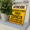 A vintage Spanish beer metal sign with text warning that the refrigerator is only for beer.
